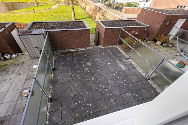 Foto - Te koop: Ruime dubbele benedenwoning met parkeerplaats!